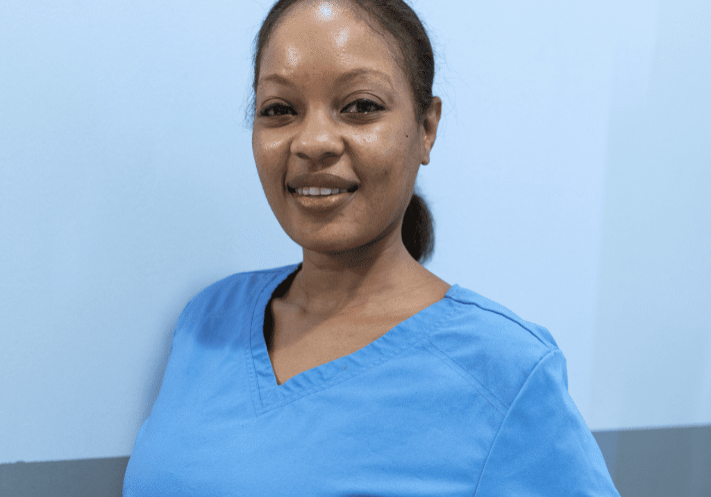 A woman wearing a blue top